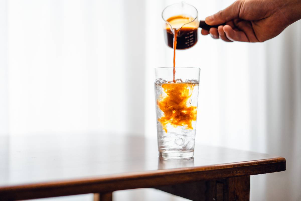 iced-black-coffee-on-desk-at-home-2023-11-27-05-02-28-utc (1)