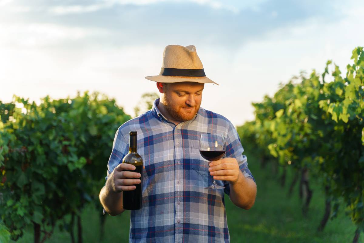 portrait-of-happy-farmer-holding-wineglass-forward-2024-11-27-20-13-36-utc (1)